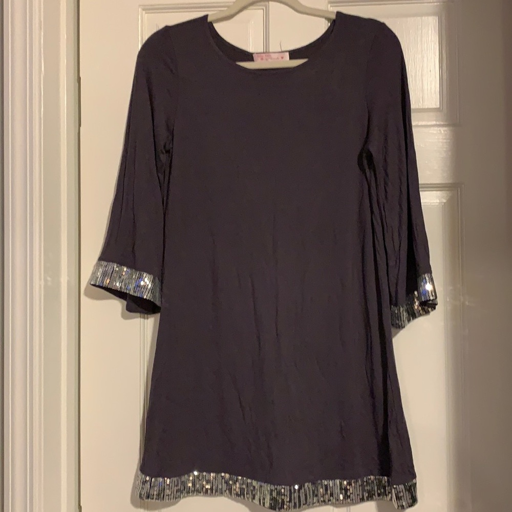 A line dress with silver sequin trim